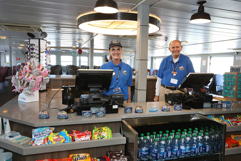 The Food & Retail team in the shopQ on MV New Jersey enjoy their work smiling for the camera