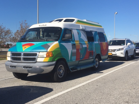 Colorful van boards the ferry